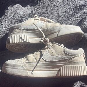 Cream and White Nike Sneakers